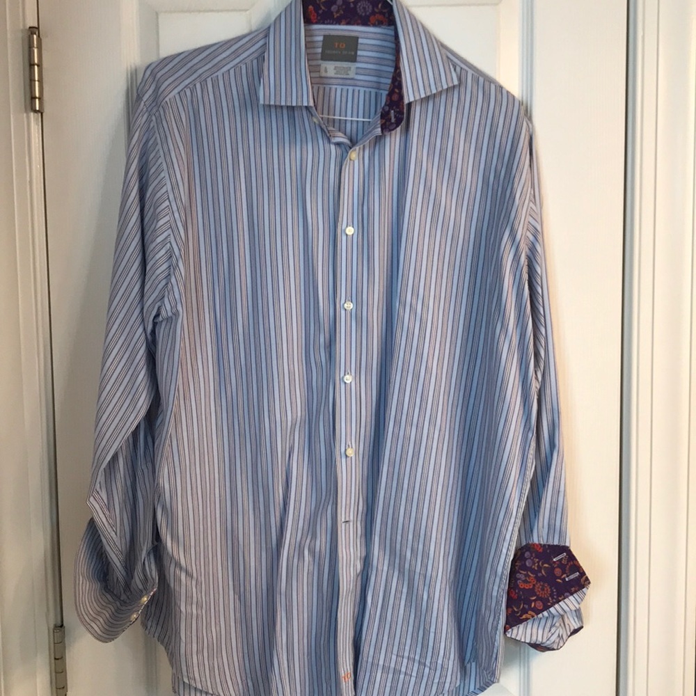 Blue and purple striped shirt.